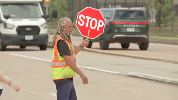 Video shows crossing guard shield car from children with his body in Timbergrove area near Sinclair Elementary School