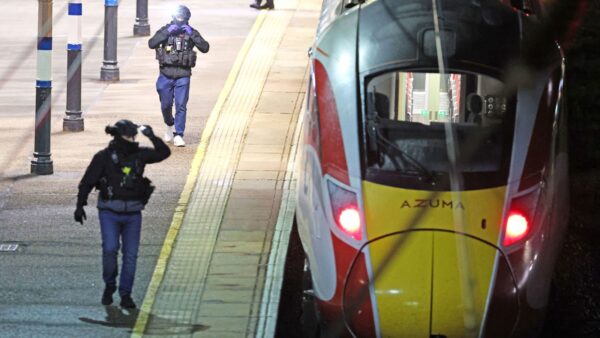 Police rule out terrorism in stabbing attack on UK train after 2 men are arrested